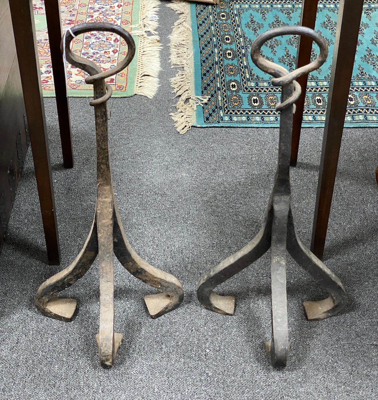 A pair of wrought iron door stops, height 61cm